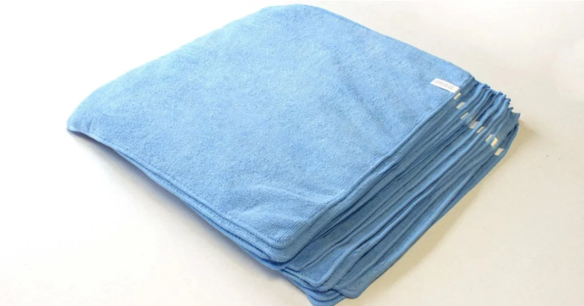 Stack of blue microfiber cleaning cloths